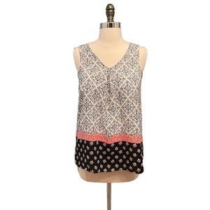 Maurice’s floral silky high/low blouse with delicate pattern and keyhole back.